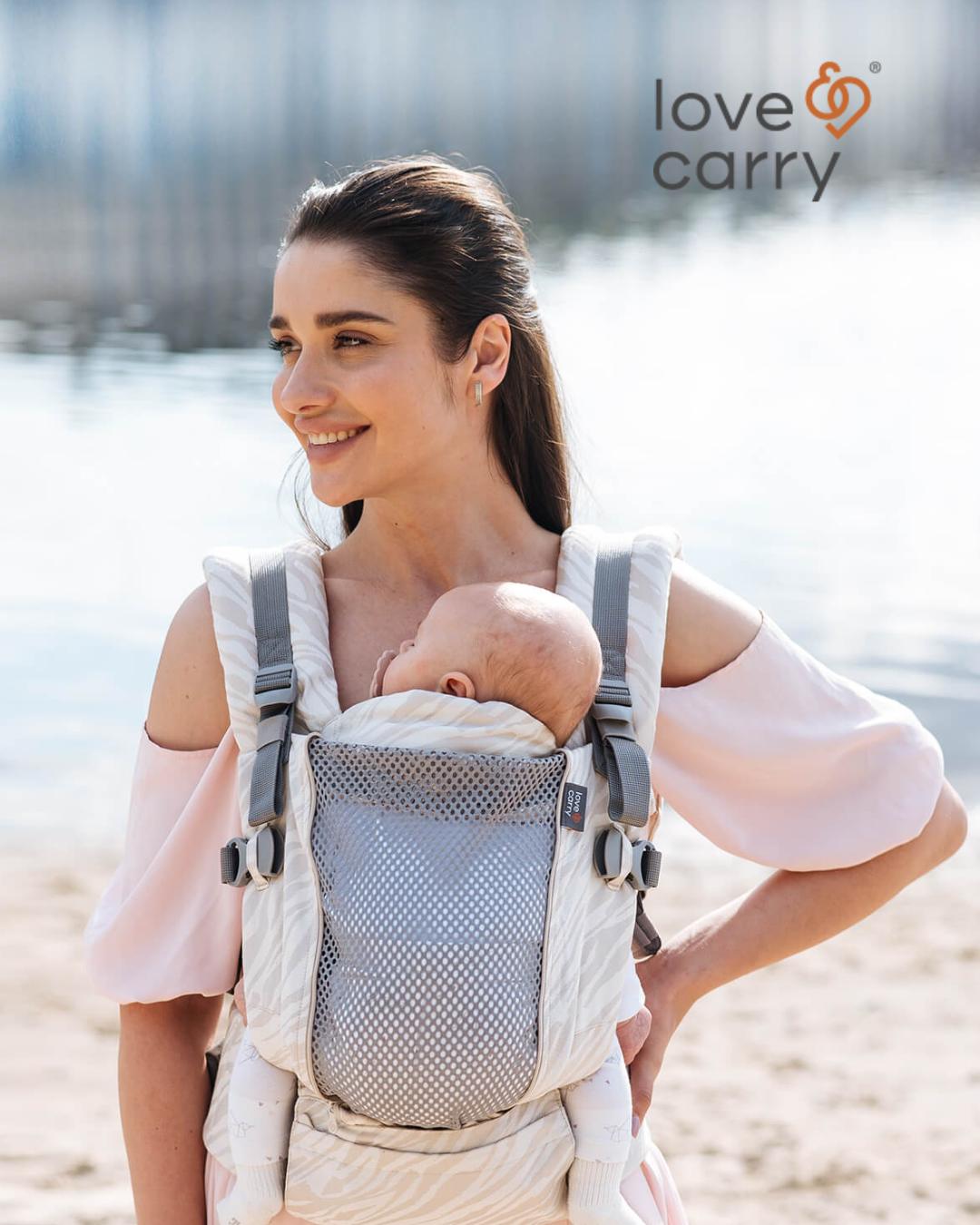 mochila portabebés ergonómica y Evolutiva de Love and carry en uso con recién nacido